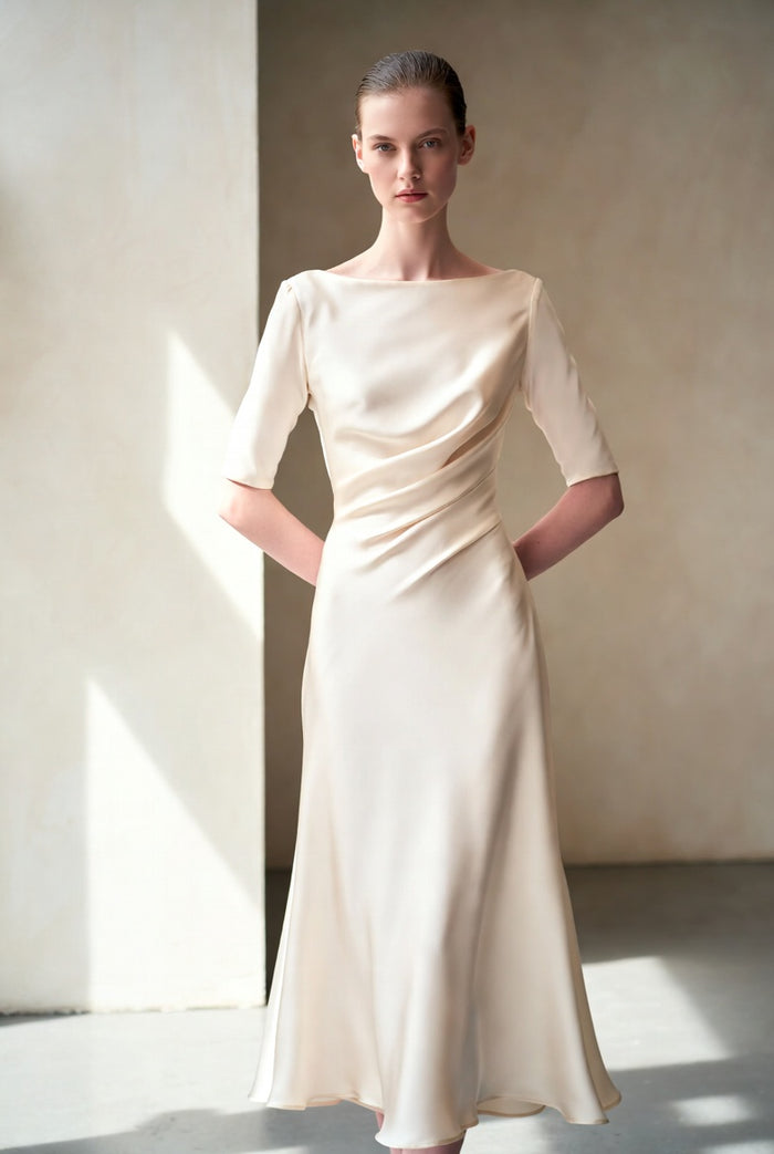 The Aurore Slip Dress — cream silk bias-cut midi